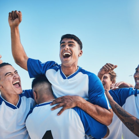 athletes cheer after a win